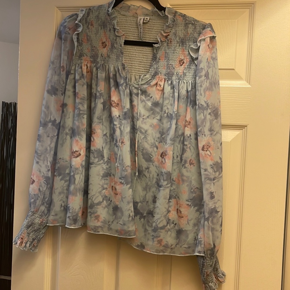 Beautiful woman’s top with the at neck area